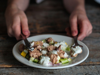 Cod liver and vegetables salad (seafood salad) - healthy food (fresh vegetable set).  Food background