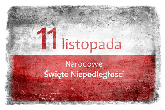 White and red flag of Poland destroyed and stained during battles with the inscription 11 November National Independence Day - in Polish