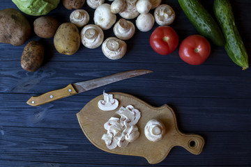 Fototapeta premium Vegetables on a rustic table. Organic ingredients for cooking.