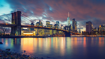 Brooklyn bridge and Manhattan after sunset, New York City