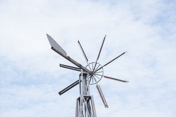 Old wind turbine wind blue sky