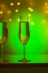 Champagne glasses in disco party bar