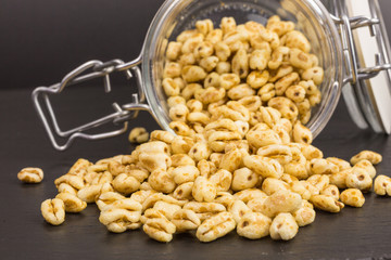 puffed wheat with honey in a glass jar