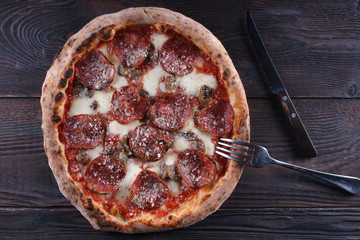 Neapolitan pizza on a wooden table