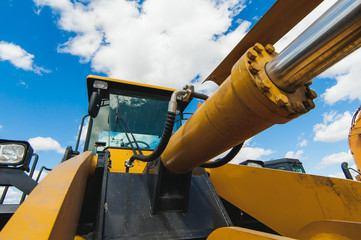 Excavator Loader Machine. Side View of Front Hoe Loader. Industrial Vehicle. Heavy Equipment...
