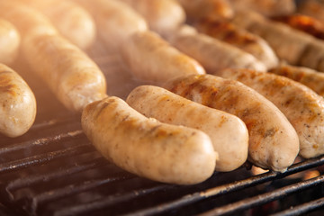 Grilled meat sausages on charcoal grill