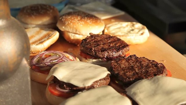 Cooking hamburgers on a picnic