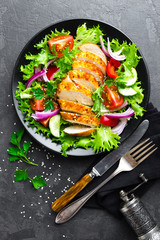 Salad with chicken meat. Fresh vegetable salad with chicken breast. Meat salad with chicken fillet and fresh vegetables on plate