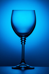Wine glass with lighting. Club background
