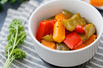 Tossed vegetables salad with roasted bell peppers and pumpkin.