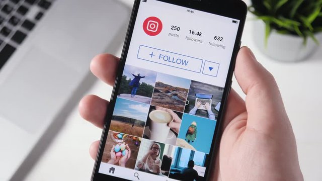 Pressing follow button on social media on social media app