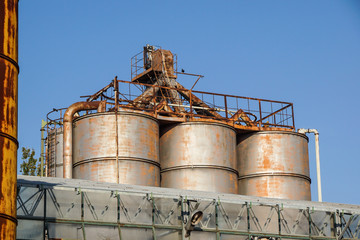 old rustic iron silo at old industrial farm