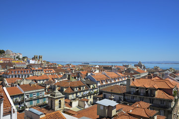 Fototapeta na wymiar Beautiful view of the city of Lisbon, with the skyline and the Lisbon Cathedral and the Tagus River on the background; Concept for travel in Lisbon