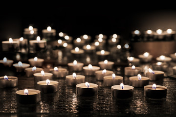 Burring candles on decorative glass.