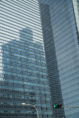 close-up of window walls skyscrapers background