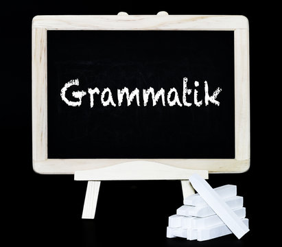 Grammatik Kreideschrift auf einer Tafel