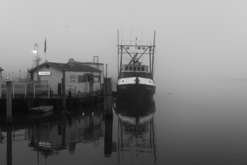 Boat in morning fog