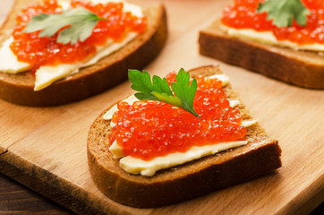 Sandwiches with red caviar