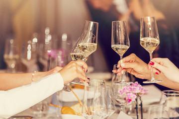 Celebration. People holding glasses of champagne making a toast