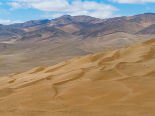 Fototapeta na wymiar Large dunes in the Atacama desert, near the city of Copiapo, Northern Chile