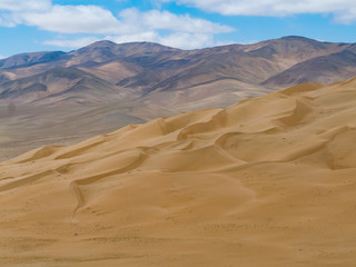 Fototapeta na wymiar Large dunes in the Atacama desert, near the city of Copiapo, Northern Chile