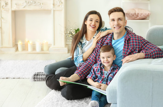 Happy Family Spending Time Together On Winter Vacation At Home