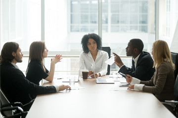 Multiracial people having dispute about bad document at group meeting, african businessman disagreeing with contract terms at multi-ethnic negotiations in lawyers office, fraud or legal fight concept - obrazy, fototapety, plakaty