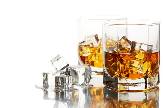 Whiskey glasses with ice.