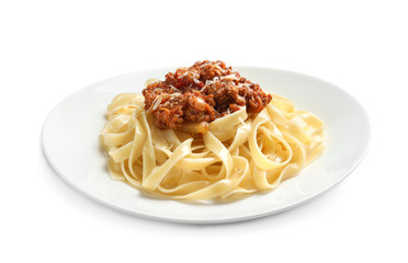 Plate with delicious pasta bolognese on white background