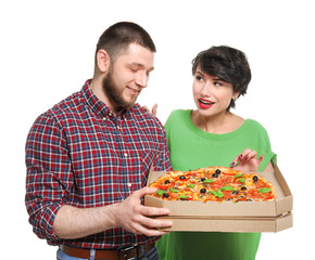 Attractive young couple with delicious pizza on white background