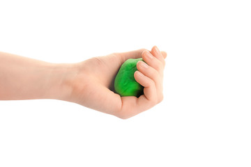 Woman holding colorful play dough on white background