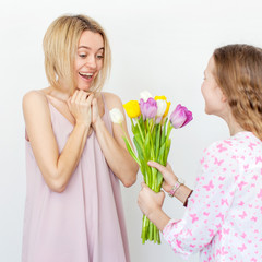 Daughter give mom flowers