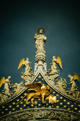 Details and statue on Basilica of St. Mark in Venice, Italy