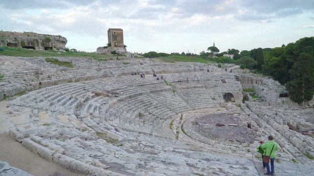 2635_Some_people_taking_photos_of_the_Siracusa_ampitheater_in_Sicily_Italy.mov
