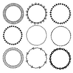 Wreaths hand drawn vector collection. Set of round doodle frames isolated on white background.