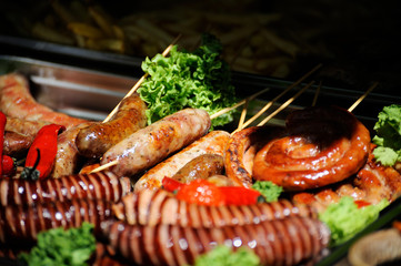 Grilled sausage close-up .