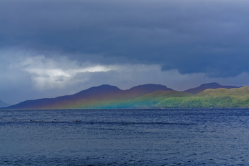 Patagonian landscape with a rainbow background product of moisture in the air
