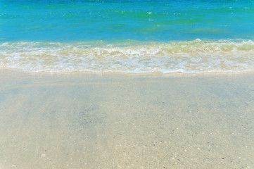 Wave of the sea on the sand beach