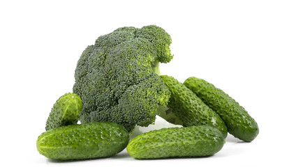 cucumber and broccoli on white background