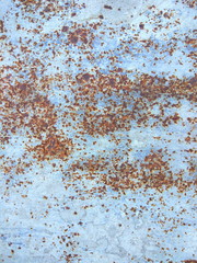 Texture of rusty surface, abstract brown background of old iron sheet, pattern with rust for designer, minimalistic background