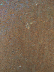 Texture of rusty surface, abstract brown background of old iron sheet, pattern with rust for designer, minimalistic background