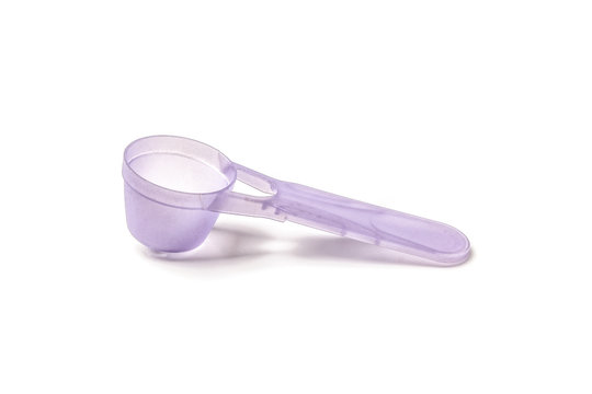 Measured plastic spoon