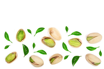 Pistachios with leaves isolated on white background with copy space for your text, top view. Flat lay pattern