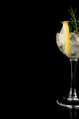 Glass of a cold cocktail drink with white wine