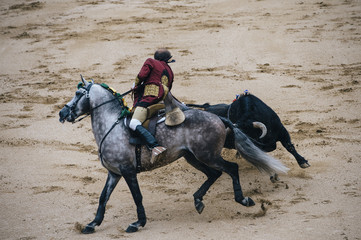 Corrida. Matador and horse Fighting in a typical Spanish Bullfight