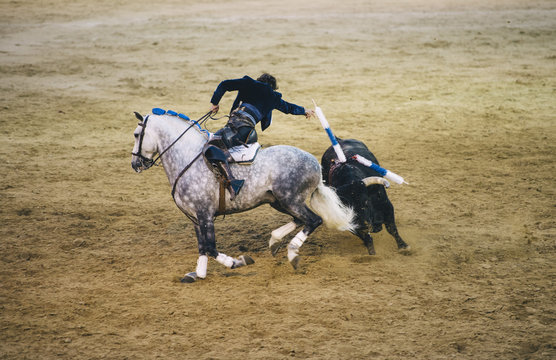 Corrida. Matador and horse Fighting in a typical Spanish Bullfight