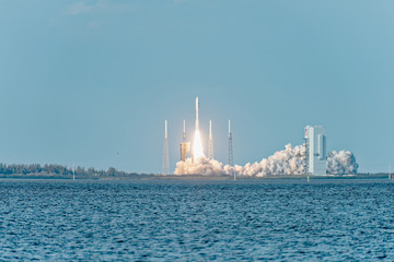 NASA rocket clearing the launchpad on liftoff