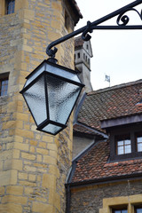 Fototapeta na wymiar Old street lamp in Neuchatel castle, Switzerland