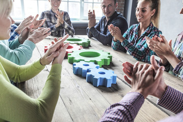 Business people with cogs of business