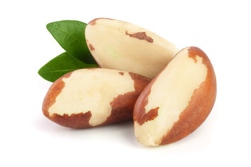 Brazil nuts with leaves isolated on white background closeup. Full depth of field